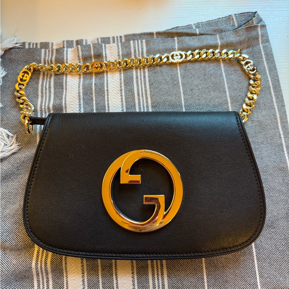 Gucci Black Shoulder Bag with Gold Accents